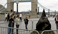 A large drill bit emerging from the ground on the south side of the river near to Tower Bridge. 